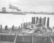 TodayInNewOrleansHistory/1957February1MississippiRiverBridgeUnderConstruction.jpg